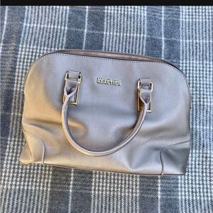 Kenneth Cole Reaction Silver purse with Elegant Metallic Accents